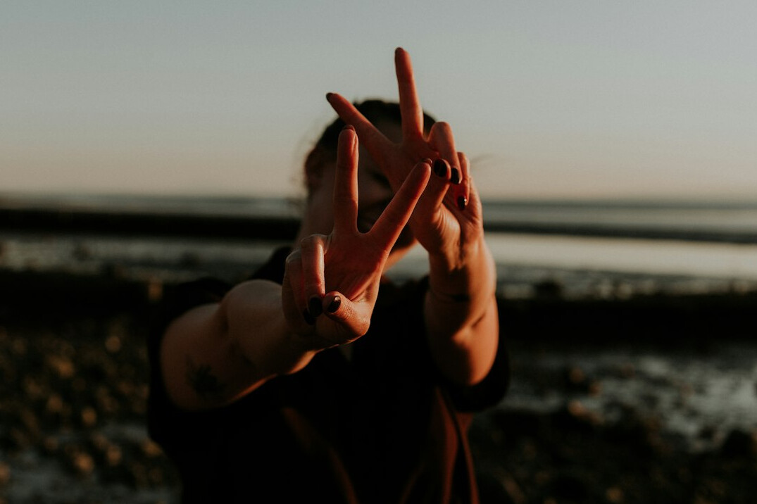 person using hand gestures