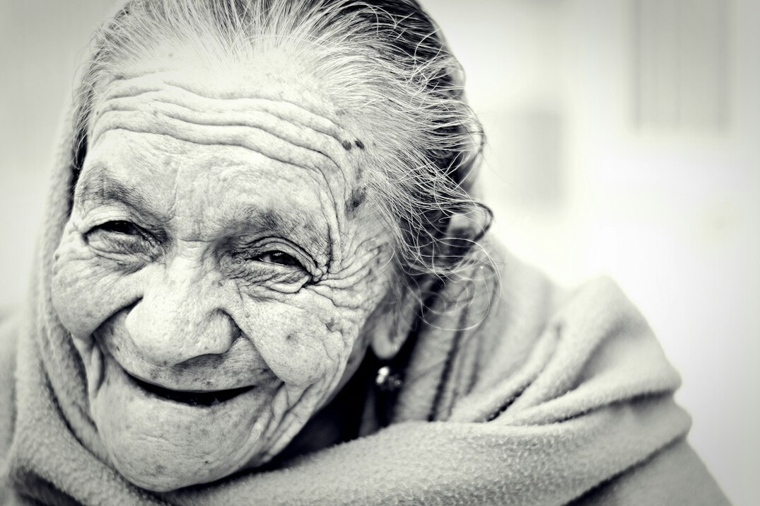 woman smiling warmly